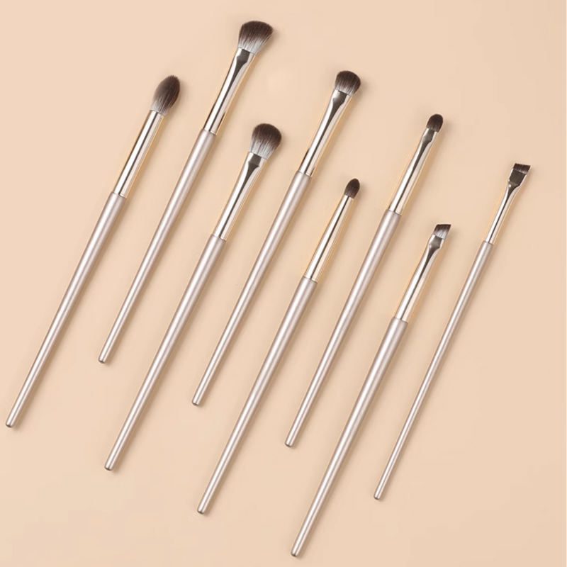 Professional 15-piece makeup brush set featuring 13 eye shadow brushes, blending brushes, angled eyeliner brushes, and detail brushes with soft synthetic bristles for precise eye makeup application.