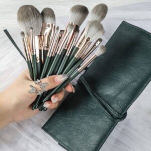 14-piece luxury makeup brush set featuring dark green wood handles, soft synthetic bristles, and professional face and eye brushes for foundation, concealer, powder, blush, and eyeshadow application.
