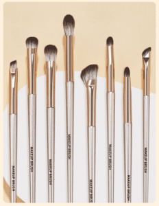 Complete 15-piece makeup brush set with natural hair bristles, including eyeshadow, crease, blending, angled eyebrow, and eyelash brushes for professional eye makeup application.