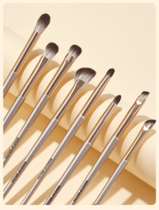 Complete 15-piece makeup brush set with natural hair bristles, including eyeshadow, crease, blending, angled eyebrow, and eyelash brushes for professional eye makeup application.