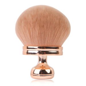 Large kabuki makeup brush with ultra-soft synthetic bristles and a rose gold handle, designed for self tanner, body makeup, bronzer, powder, and blending applications.