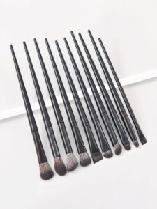 10-piece black eye makeup brush set with soft synthetic bristles, including angled, flat, blending, crease, and detail brushes, perfect for eyeshadow, eyeliner, and eyebrow application.
