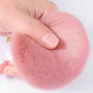 Compact fluffy makeup brush with ultra-soft pink synthetic bristles and a metallic handle, suitable for blush, bronzer, nail powder application, and manicure dust removal.
