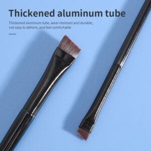 Professional angled makeup brush with slim black handle and synthetic bristles, designed for nose contouring, eyeliner detailing, and precision eye shadow blending.