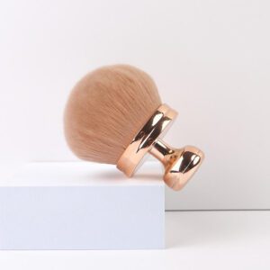 Large kabuki makeup brush with ultra-soft synthetic bristles and a rose gold handle, designed for self tanner, body makeup, bronzer, powder, and blending applications.