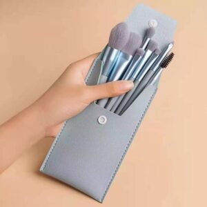 Pink makeup brush set featuring six professional cosmetic brushes for foundation, concealer, blush, eyeshadow, eyeliner, powder application, and eyebrow grooming with soft synthetic bristles.