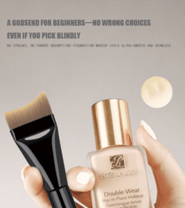 Professional tongue shaped foundation brush with soft synthetic bristles and black handle, designed for liquid foundation, facial masks, skincare products, and smooth face coverage.