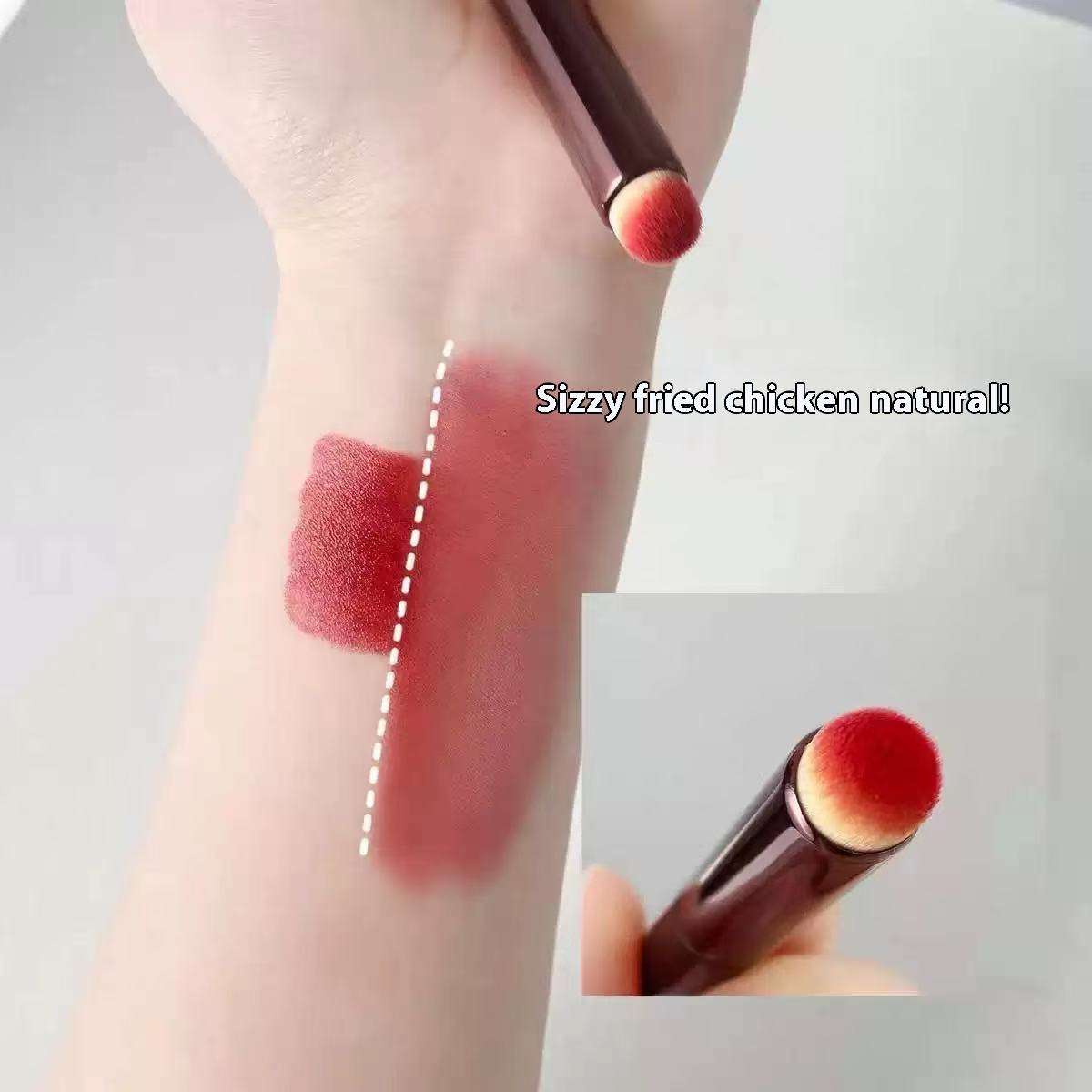 Compact multifunctional flat makeup brush with synthetic bristles and metallic handle, suitable for lipstick, lip gloss, concealer, and detailed facial makeup application.