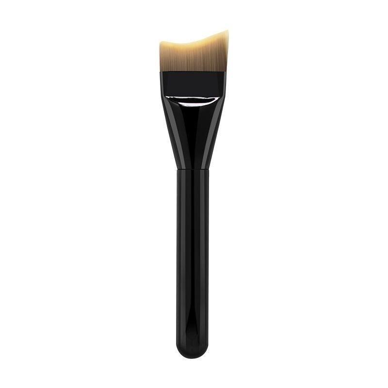 Professional tongue shaped foundation brush with soft synthetic bristles and black handle, designed for liquid foundation, facial masks, skincare products, and smooth face coverage.