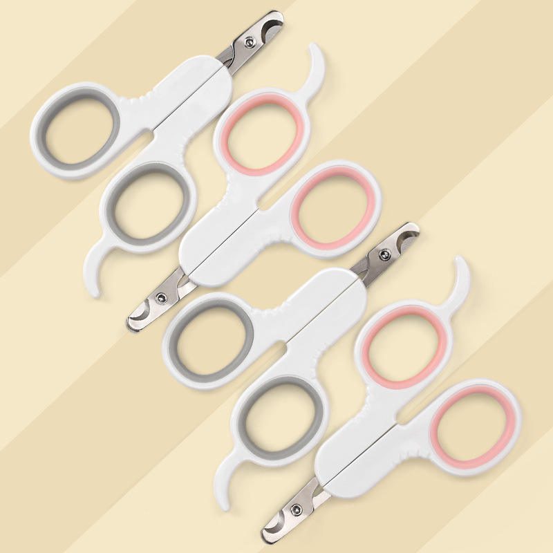 Small pet nail clipper with ergonomic handle for cats, puppies, and small dogs, designed for safe and precise nail trimming.
