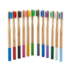Set of eco-friendly bamboo toothbrushes with medium nylon bristles, customizable with logo and packaging, ideal for adult home use and bulk wholesale orders