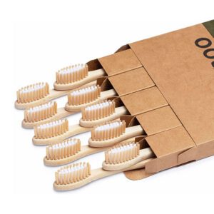 Set of bamboo toothbrushes with medium nylon bristles, natural wood handles, recyclable packaging, suitable for adult home use and sustainable oral care