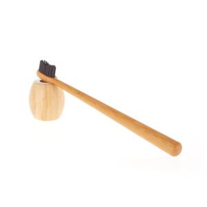 Bamboo toothbrush set with medium nylon bristles and bamboo holder, featuring a sustainable design and optional custom logo, ideal for home or bulk wholesale