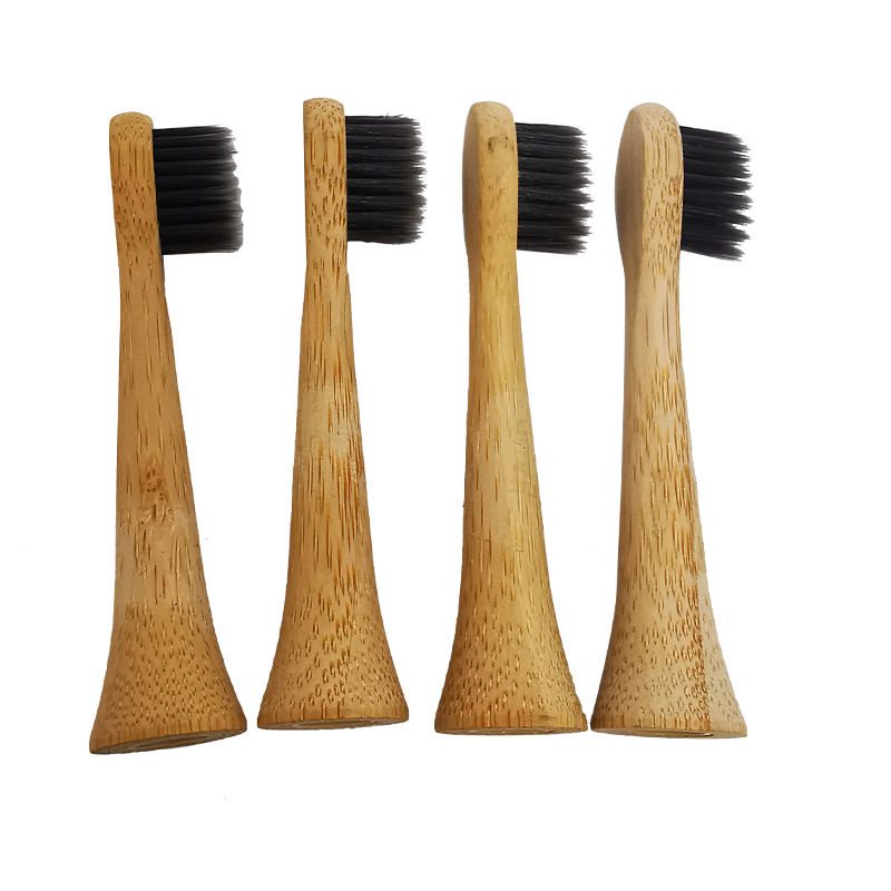 Set of natural bamboo toothbrush replacement heads with boar bristles, suitable for eco-friendly adult oral care and sustainable hygiene