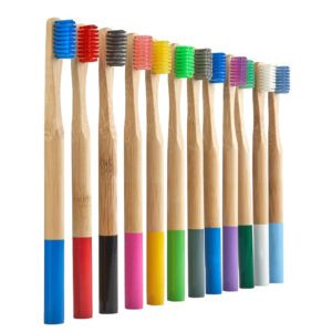 Set of eco-friendly bamboo toothbrushes with medium nylon bristles, customizable with logo and packaging, ideal for adult home use and bulk wholesale orders