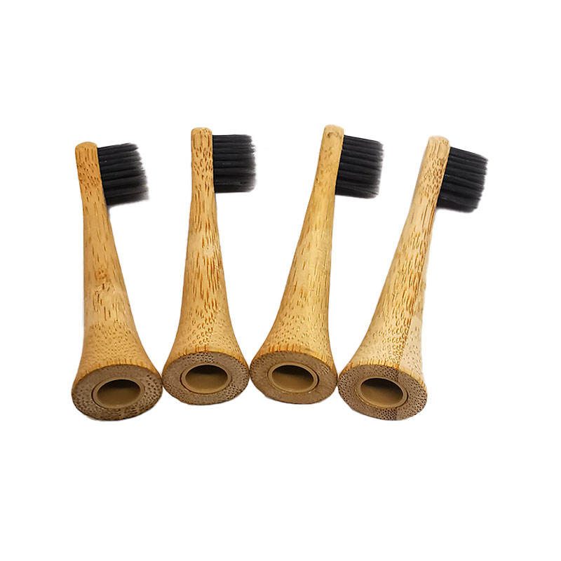 Set of natural bamboo toothbrush replacement heads with boar bristles, suitable for eco-friendly adult oral care and sustainable hygiene