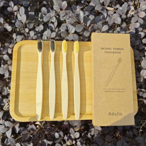 Pack of ten eco-friendly bamboo toothbrushes with colorful BPA-free bristles and recyclable kraft paper packaging, designed for adults and sustainable oral care