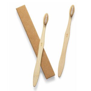Set of bamboo toothbrushes with medium nylon bristles, natural wood handles, recyclable packaging, suitable for adult home use and sustainable oral care